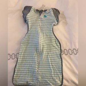 Love to dream transitional swaddle with zip off arms.
